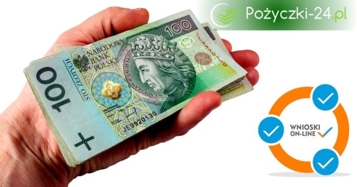 Plik banknotów 100 zł na dłoni